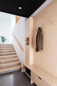 ASCENDING COURTYARD HOUSE PHOTO ENTRY SHELF