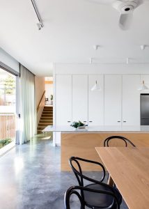 ASCENDING COURTYARD HOUSE PHOTO KITCHEN TOWARDS STAIRS