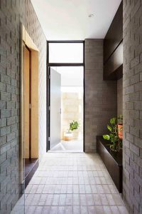 PERFORATED HOUSE PHOTO ENTRY