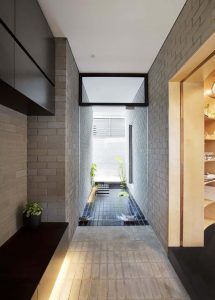 PERFORATED HOUSE PHOTO ENTRY TO POND