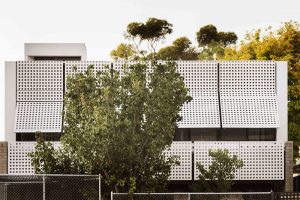 PERFORATED HOUSE PHOTO FACADE CLOSEUP