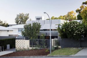 PERFORATED HOUSE PHOTO FRONT CORNER SHUTTERS