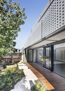 PERFORATED HOUSE PHOTO FRONT GARDEN