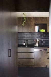 PERFORATED HOUSE PHOTO LAUNDRY TO KITCHEN