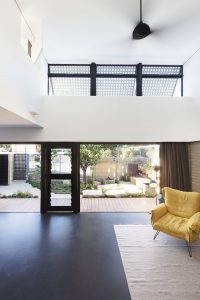 PERFORATED HOUSE PHOTO LOUNGE TOWARDS GARDEN